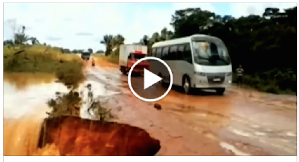 OMG !! Bus swallowed up by road
